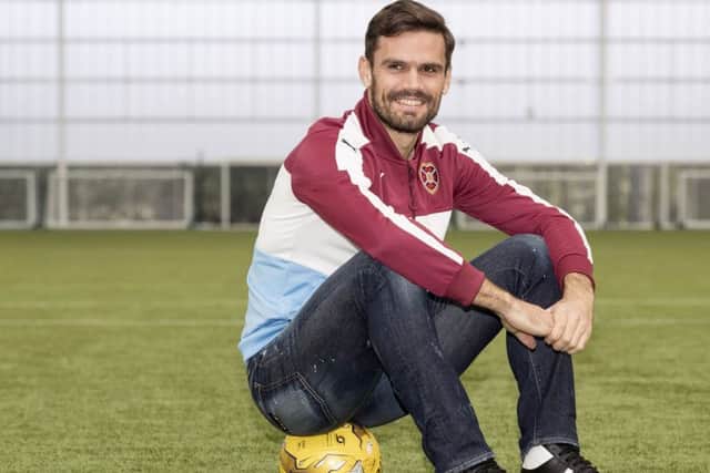 Alexandros Tziolis was sold on Hearts after speaking to former Tynecastle star Christos Karipidis. Picture: SNS.