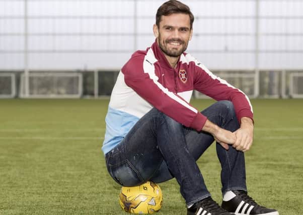 Alexandros Tziolis was sold on Hearts after speaking to former Tynecastle star Christos Karipidis. Picture: SNS.