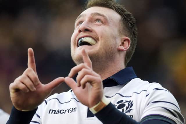 Scotland full-back Stuart Hogg always acknowledges his late friend Richard Wilkinson, who died in a road accident, with a W sign after he scores a try. Picture: Paul Devlin/SNS