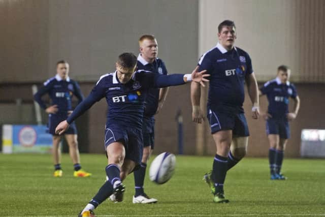 Josh Henderson kicks a penalty during the narrow defeat for Scotland U20s. Picture: Bill Murray/SNS/SRU