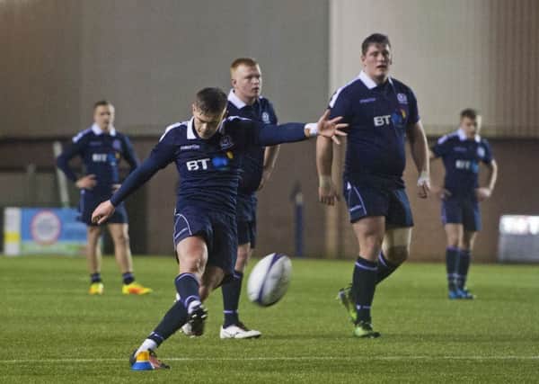Josh Henderson kicks a penalty during the narrow defeat for Scotland U20s. Picture: Bill Murray/SNS/SRU