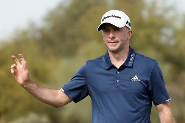 Martin Laird acknowledges the crowd on his way to a flawless 66 in the second round of the Waste Management Phoenix Open. Picture: Getty Images