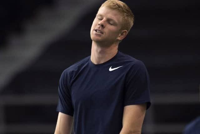 Disappointment for Britain's Kyle Edmund during the defeat against Canada's Vasek Pospisil  in the Davis Cup in Ottawa. Picture: Adrian Wyld/The Canadian Press via AP