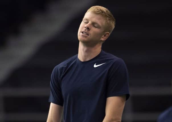 Disappointment for Britain's Kyle Edmund during the defeat against Canada's Vasek Pospisil  in the Davis Cup in Ottawa. Picture: Adrian Wyld/The Canadian Press via AP