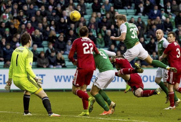 Jason Cummings scores Hibs' equaliser in their home draw with Ayr United. Picture: SNS/Alan Rennie
