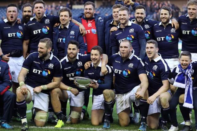 Scotland pose with the Centenary Quaich trophy after their win over Ireland. Photograph: Owen Humphreys/PA