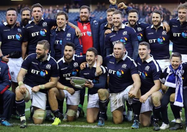 Scotland pose with the Centenary Quaich trophy after their win over Ireland. Photograph: Owen Humphreys/PA
