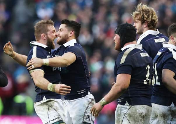 You beauty: John Barclay celebrates with Sean Maitland as Zander Fagerson and Richie Gray look on. Photograph: Getty Images. Picture: Ian MacNicol/Getty Images