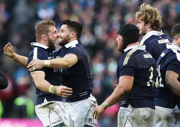 You beauty: John Barclay celebrates with Sean Maitland  as Zander Fagerson and Richie Gray look on. Photograph: Getty Images. Picture: Ian MacNicol/Getty Images