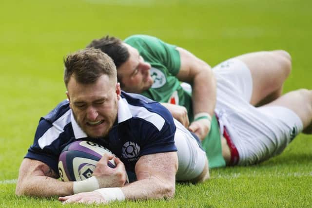 Stuart Hogg crosses for Scotland's first try. Picture: SNS.