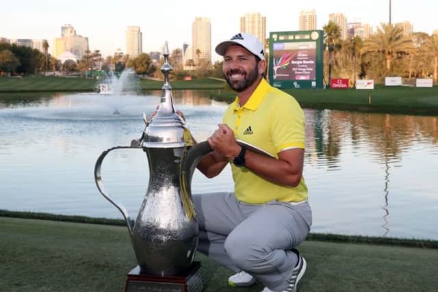 Sergio Garcia poses with the trophy after winning the Omega Dubai Desert Classic. Picture: AFP/Getty Images