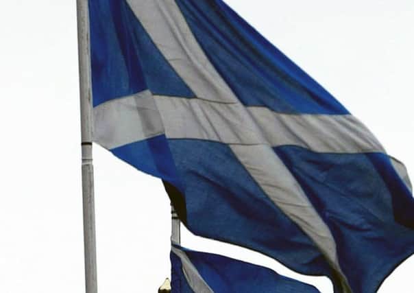 Three Scottish flags of St Andrew. Picture: David Cheskin/PA Wire