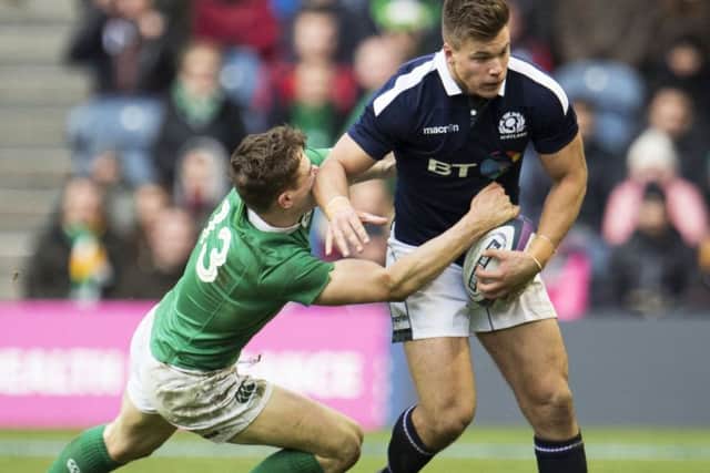 Ireland's Garry Ringrose challenges Scotland's Huw Jones in the Six Nations clash at BT Murrayfield.