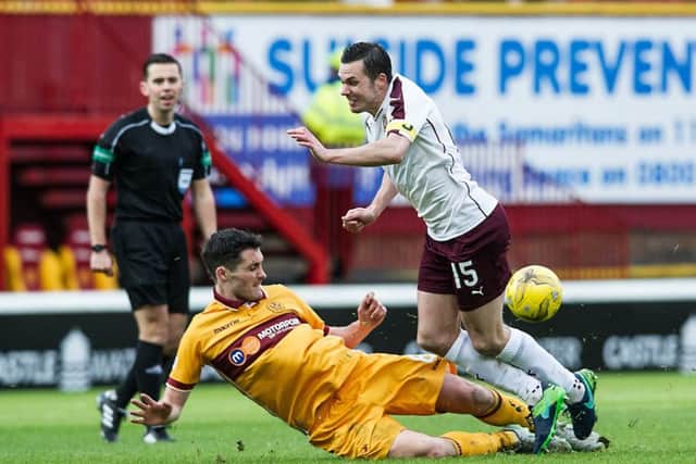 Carl McHugh was red-carded for a lunge on Don Cowie. Picture: John Devlin