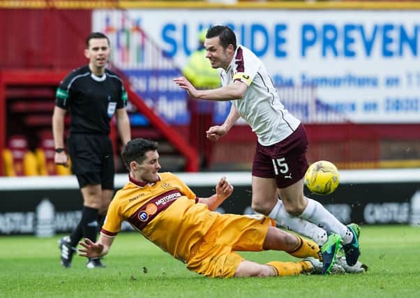 Carl McHugh was red-carded for a lunge on Don Cowie
. Picture: John Devlin
