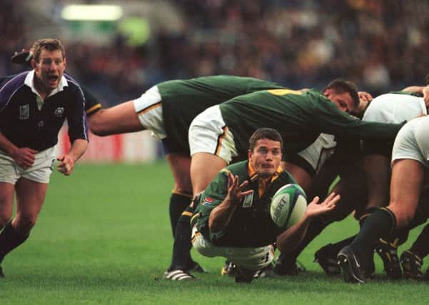 Joost Van der Westhuizen displays his skills for South Africa against Scotland in 1999. Picture: Neil Hanna.