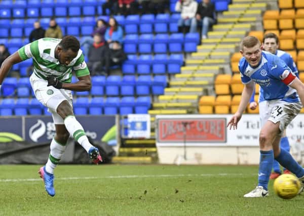 Moussa Dembele sweeps home his third goal against St Johnstone. Picture: SNS.