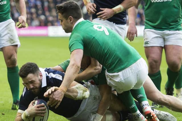 Alex Dunbar  scores Scotland's third try against Ireland.