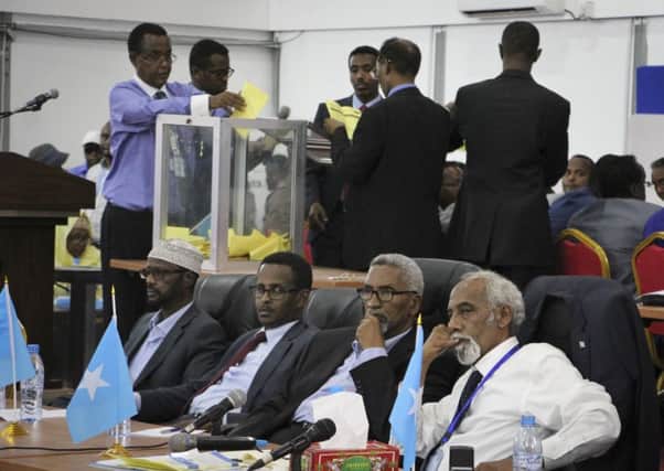 Votes are counted in the first round of the presidential election in Mogadishu. Picture: AP