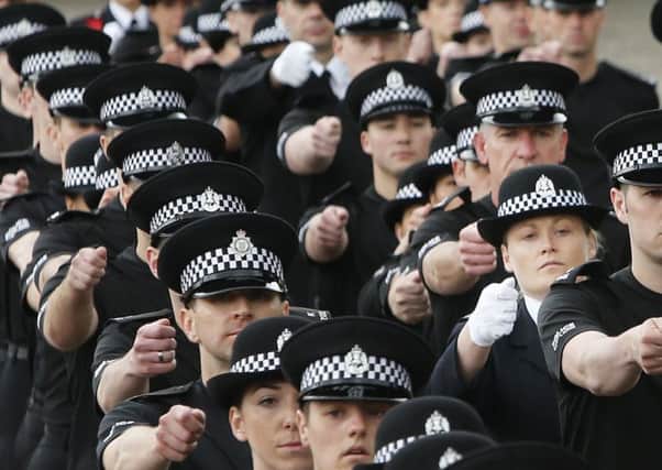 According to the leaked documents, there will be 3,000 fewer police officers on Scotlands streets. Picture: PA