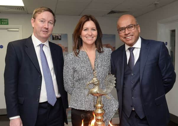 Sanjeev Gupta, right, with his wife Nicola, who will chair the GFG Foundation, and chief operating officer Tim Smith. Picture: Contributed