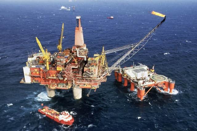 A recovery in the oil price and new sources of capital give grounds for 'cautious optimism', according to EY. Picture: STF/AFP/Getty Images