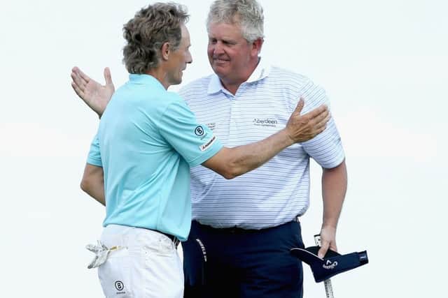 Scotlands Colin Montgomerie, right, is congratulated by long-term friend and foe Bernhard Langer of Germany after winning the 2015 Senior PGA Championship at the French Lick Resort in Indiana. Picture: Andy Lyons/Getty Images