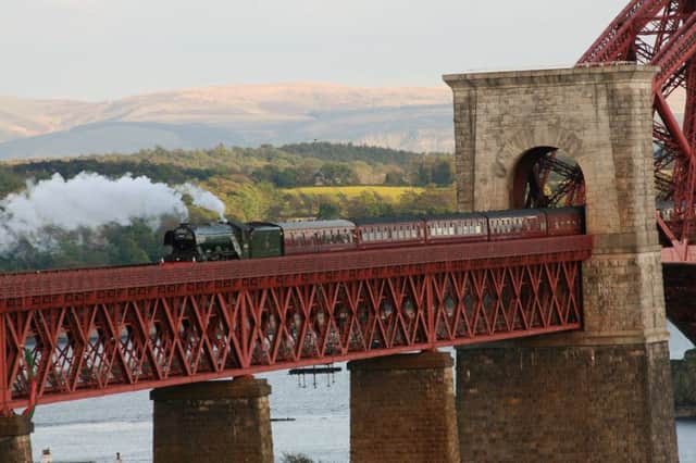 Flying Scotsman heading over the Forth Bridge in May last year. Picture: Myles Fitt