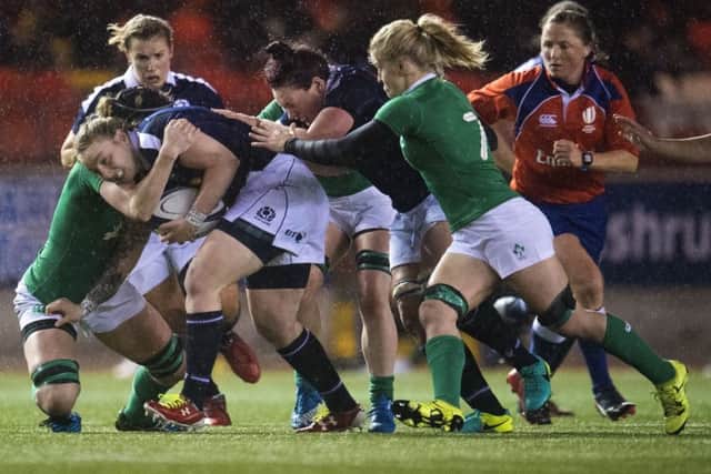 Scotland's Jade Konkel (centre) drives forward during the narrow defeat by Ireland at Broadwood. Picture: Bill Murray/SNS/SRU