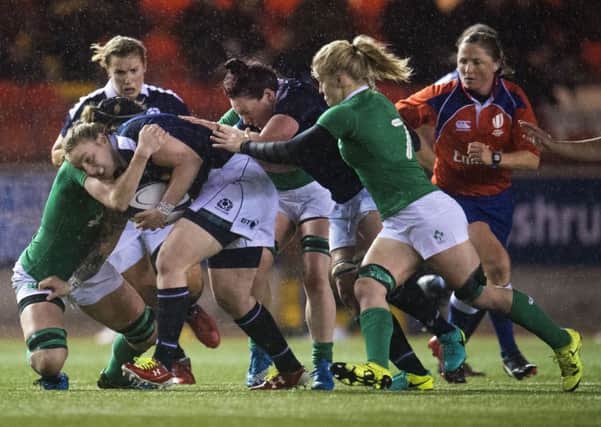 Scotland's Jade Konkel (centre) drives forward during the narrow defeat by Ireland at Broadwood. Picture: Bill Murray/SNS/SRU