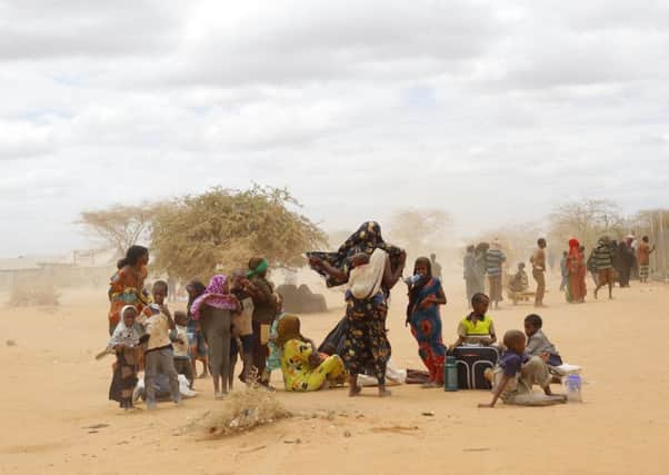 Somali refugees outside Dadaab camp which will stay open. Picture: AP