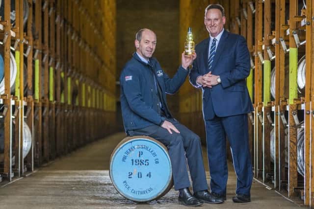 Inver Houses Roger Hall, left, toasts the funding deal with Simon Woodcock from Bank of Scotland. Picture: Chris Watt