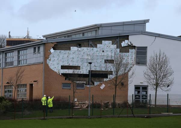 The collapsed wall at Oxgangs Primary School in Edinburgh. That there were no injuries or fatalities to children was just down to luck, says scathing report.