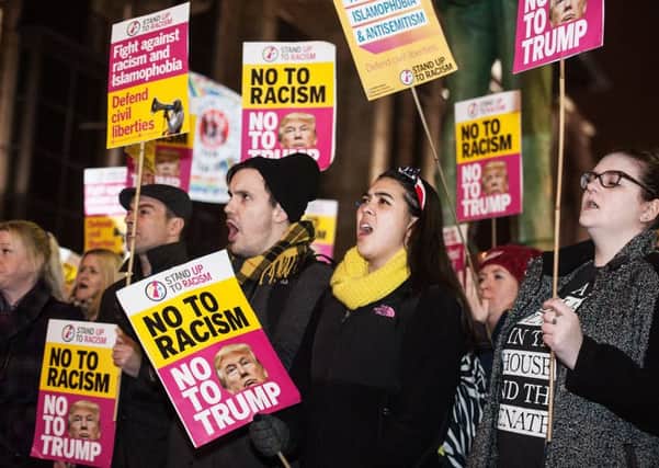 A rally in Glasgow protesting against Donald Trump's hardline immigration policies. Picture: John Devlin