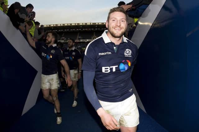 A jubilant Finn Russell leaves the pitch after Scotland's 27-22 win over Ireland at BT Murrayfield. Picture: SNS/SRU