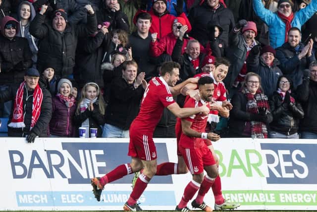 Shay Logan celebrates the winning goal as Aberdeen knock out ROss County. Picture: SNS/Alan Harvey
