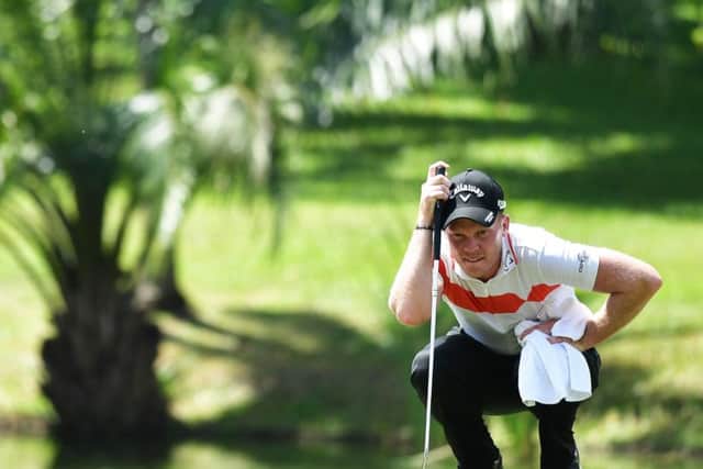 Danny Willett lines up a putt during the Maybank Championship Malaysia at Saujana Golf Club. Picture: Stuart Franklin/Getty Images