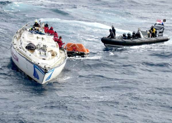 A rogue wave tore off the mast of the boat, leaving them stranded. Picture; PA