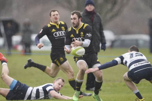 Melroses Sam Pecqueur fumbles the ball under pressure during a tight game at Goldenacre. Picture: Greg Macvean.