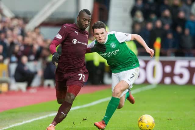 Esmael Goncalves and John McGinn battle for possession. Picture: Ian Georgeson