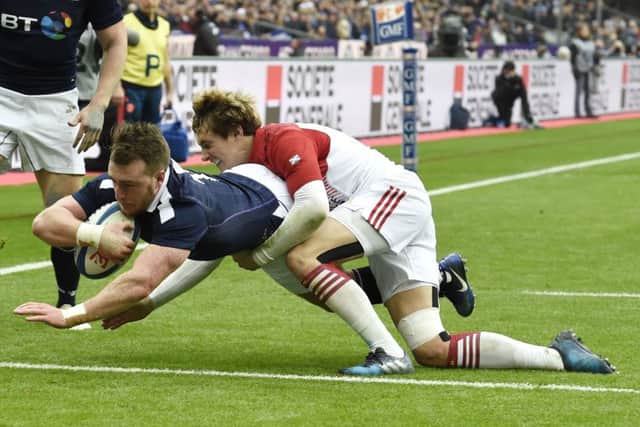 Stuart Hogg divesd over to score the first try for Scotland.
Picture: Ian Rutherford.