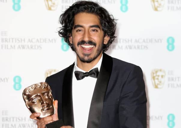 Supporting actor winner Dev Patel poses with his award during the 70th Baftas ceremony at the Royal Albert Hall. Picture: Chris Jackson/Getty Images