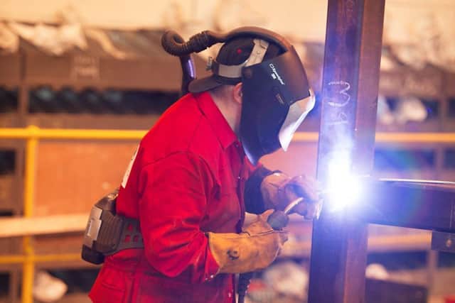 Manufacturers were behind the rise in business activity last month. Picture: John Devlin