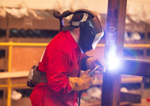 Manufacturers were behind the rise in business activity last month. Picture: John Devlin
