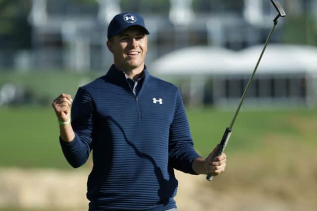 Jordan Spieth celebrates after putting out on the 18th green to win the AT&T Pebble Beach Pro-Am. Picture: Jeff Gross/Getty Images