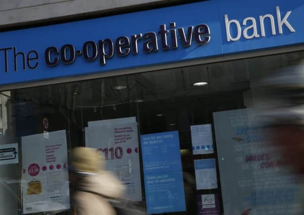 The Co-operative Bank is putting itself up for sale as it struggles to meet capital requirements designed to ensure financial institutions can survive hard times. Picture: Alastair Grant/AP