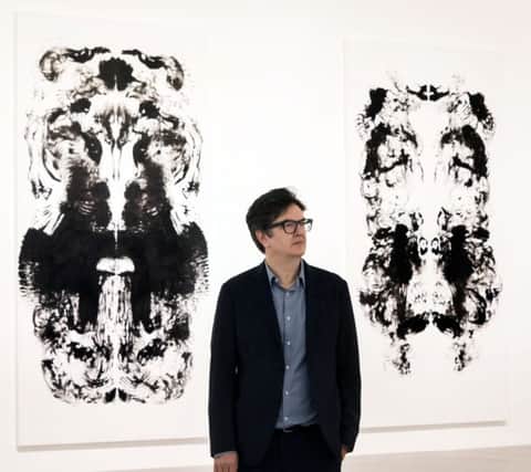 Mark Wallinger with id Painting 10 and id Painting 12 PIC: Nils Jorgensen/REX/Shutterstock