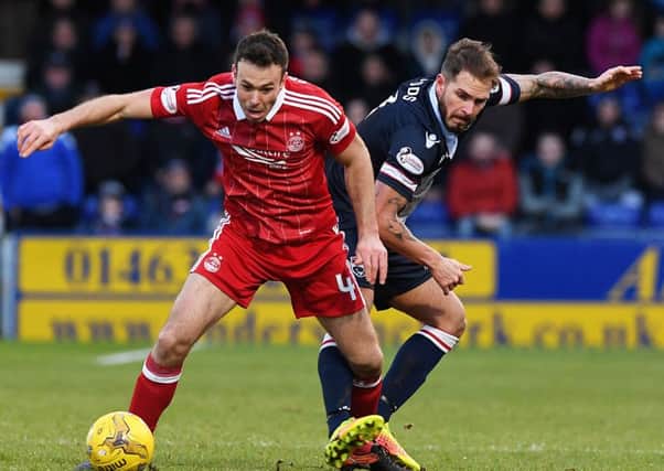 Andrew Considine has signed a contract extension with Aberdeen. Picture: SNS