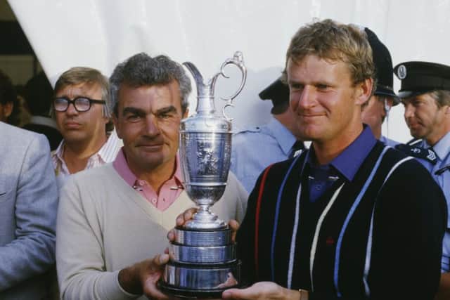 Sandy Lyle, right, with caddie Dave Musgrove after winning the Open at Royal St George's in 1985. Picture: David Cannon/Getty Images
