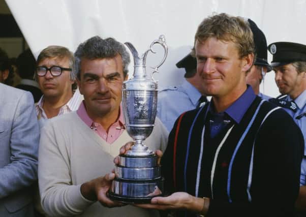 Sandy Lyle, right, with caddie Dave Musgrove after winning the Open at Royal St George's in 1985. Picture: David Cannon/Getty Images